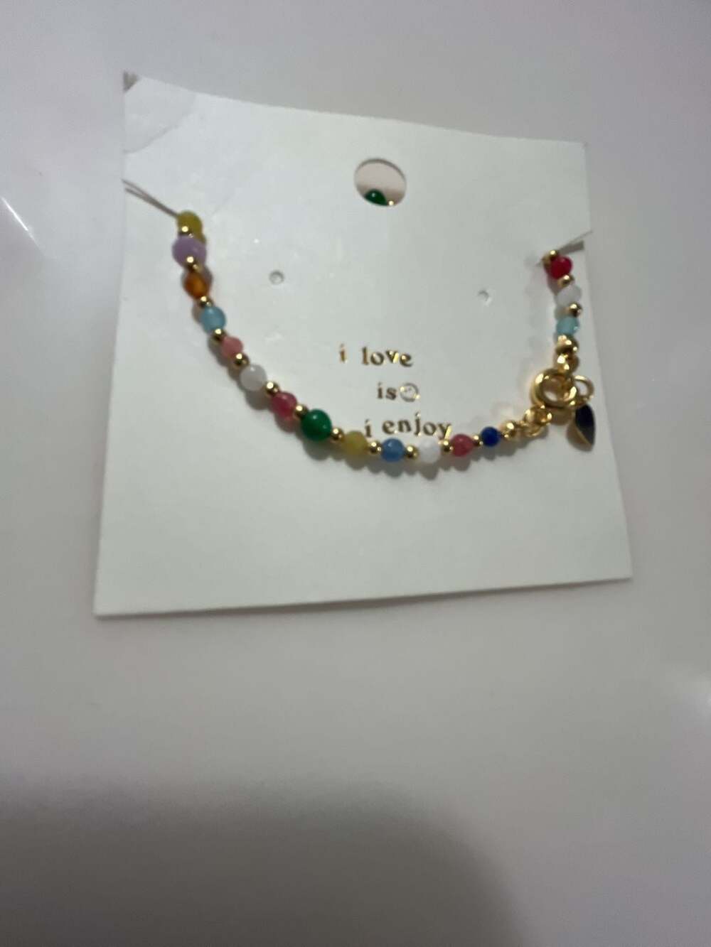 Multicolor crystal Beaded Gold Tone Bracelet with Card Display